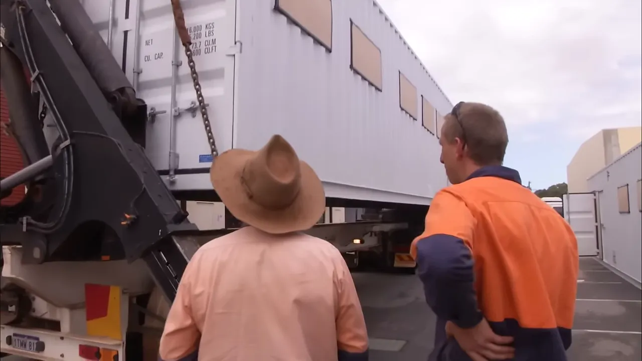 Loading the containers in the yard before departure