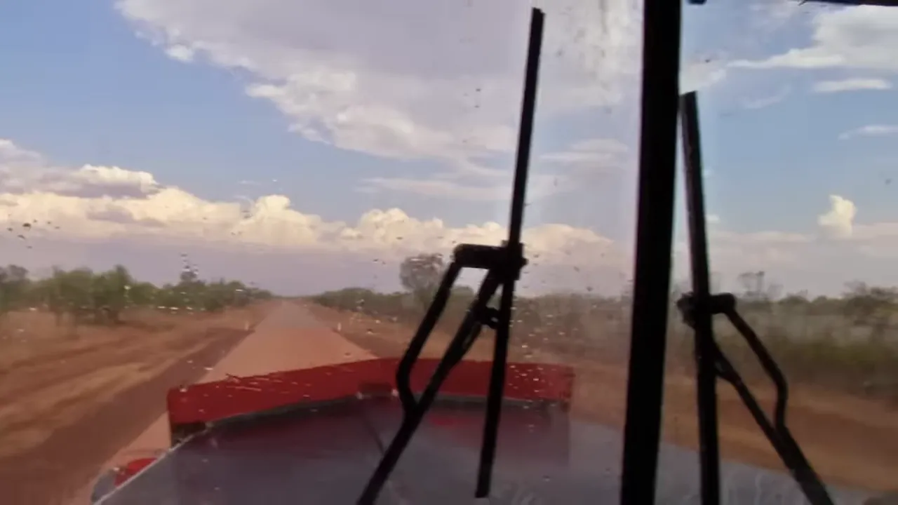 First wet-season shower hitting the windscreen on Gib River Road