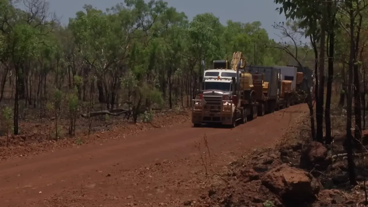 Three road trains hooked together ready to climb the jump-up