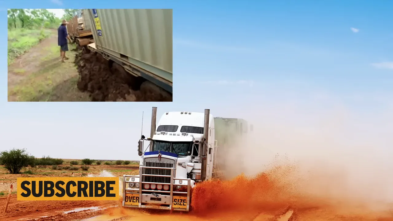 Final collapse: the road caved in and the trailer axles are buried
