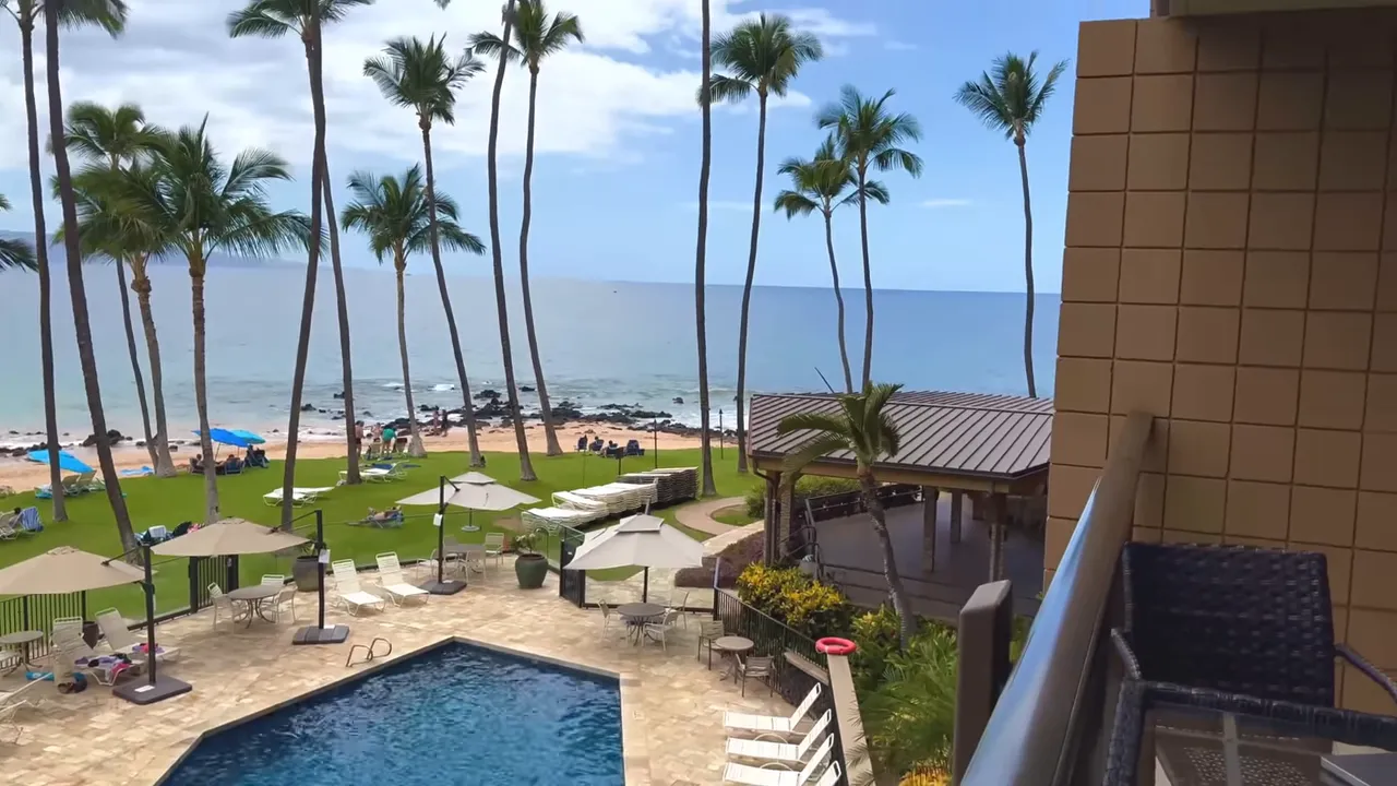 Ocean and beach views from the living room of unit 209