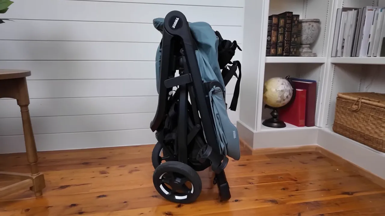 Thule Spring 2 folded and standing upright with compact fold