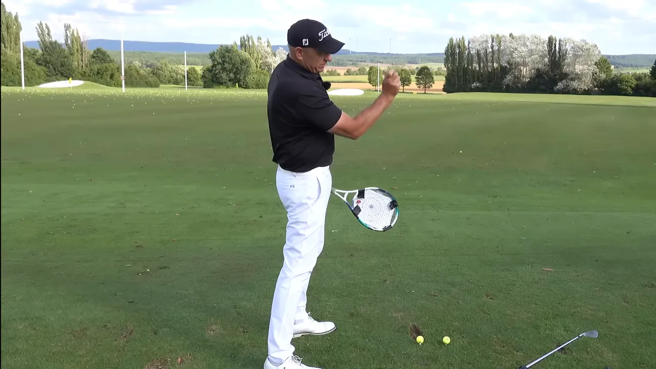 Side view of instructor showing the trail wrist set and hand position with a training paddle