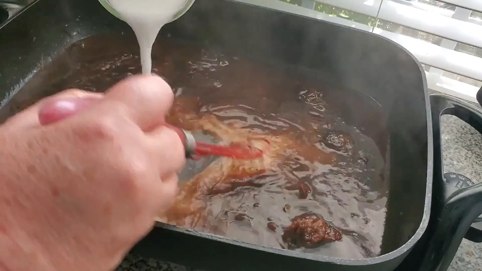 Whisking in the cornstarch slurry.