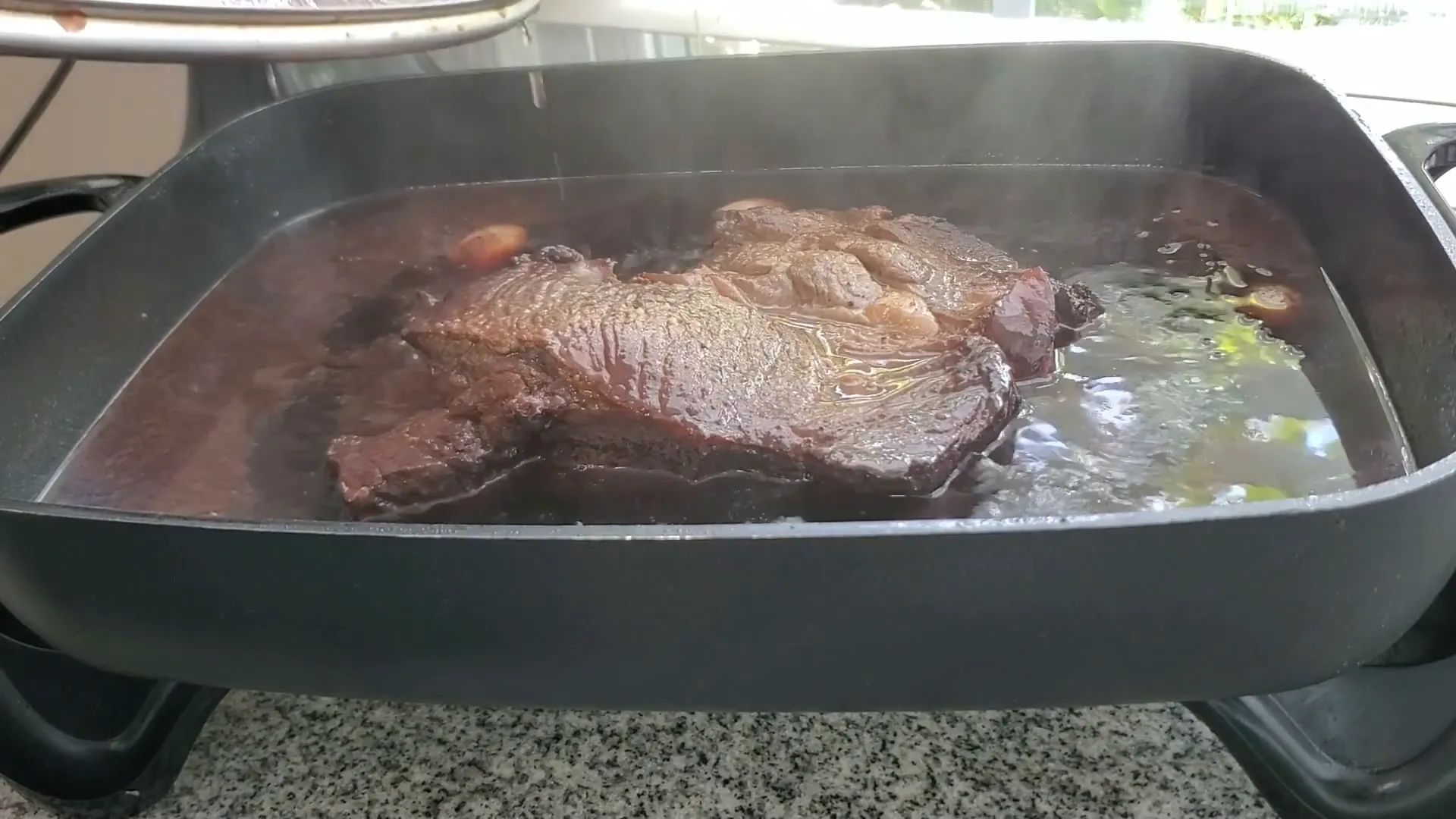 Checking on the roast after 2 hours.