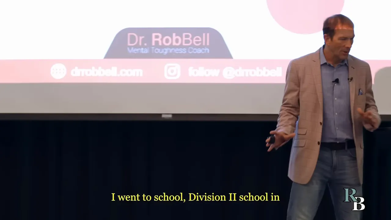 Keynote speaker Dr. Rob Bell onstage presenting a mental toughness talk