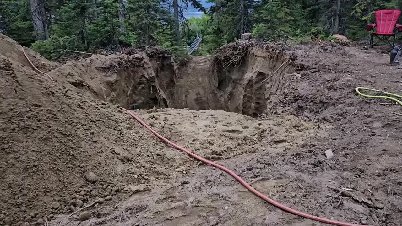 Off grid life - deep excavation with steep sandy walls and large soil piles around the opening