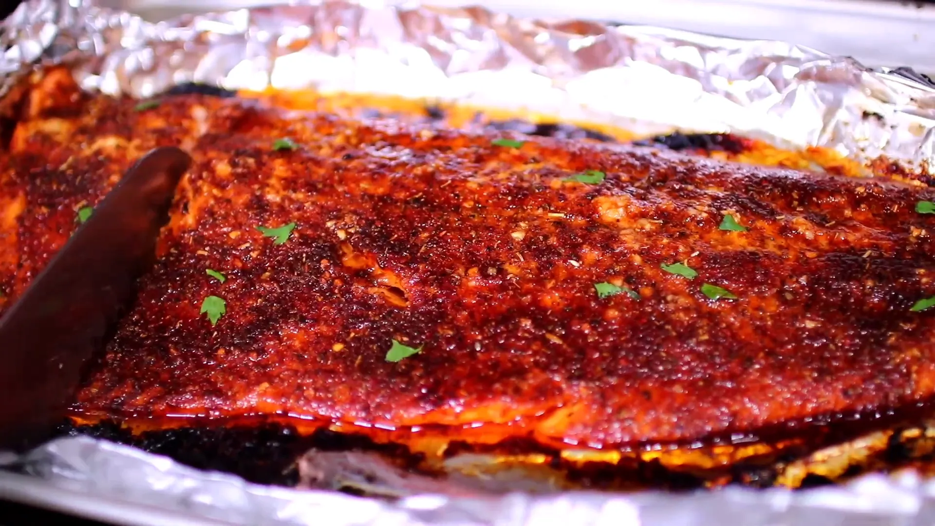 Fully baked salmon garnished with parsley