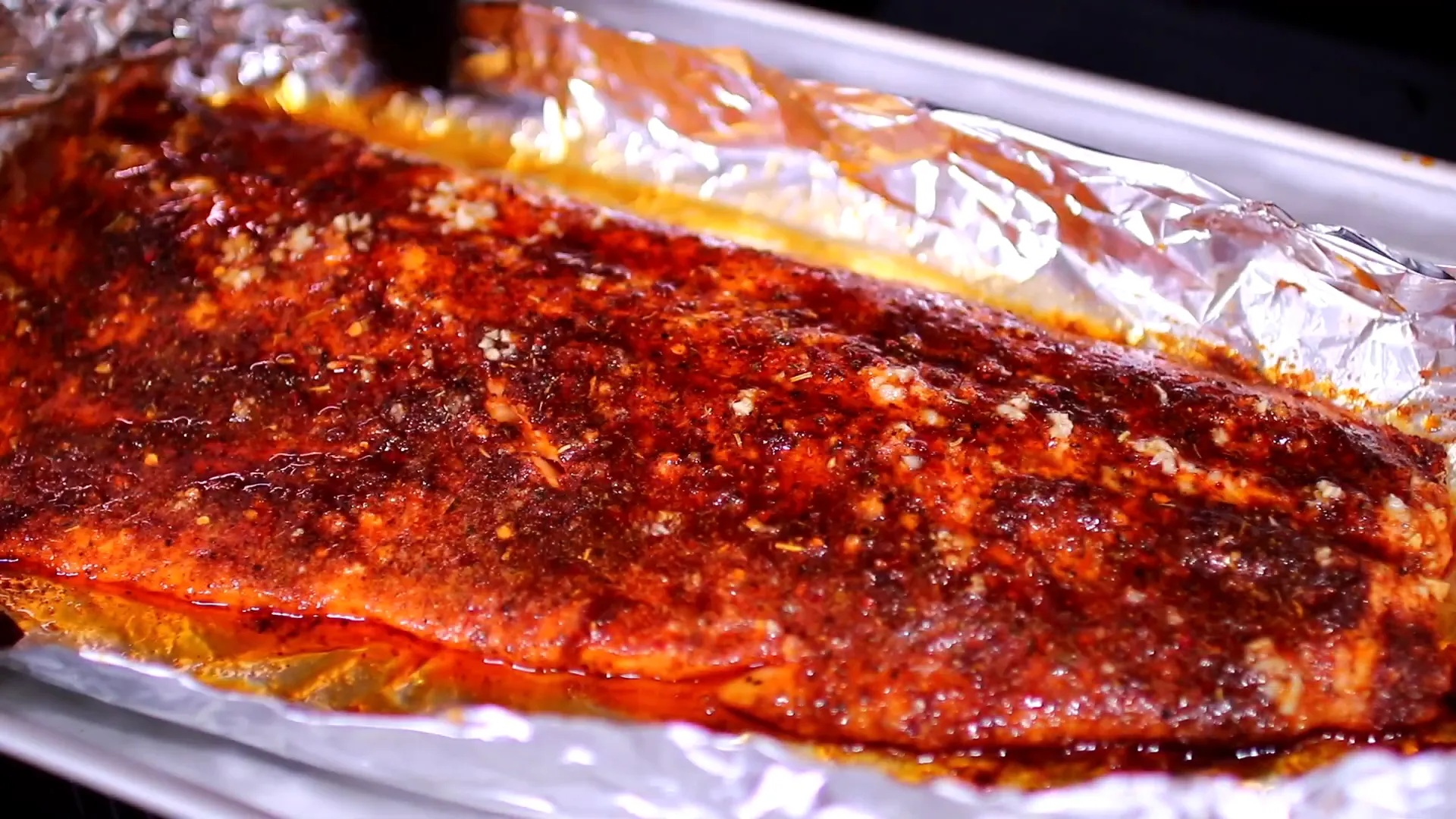 Basting the salmon before broiling
