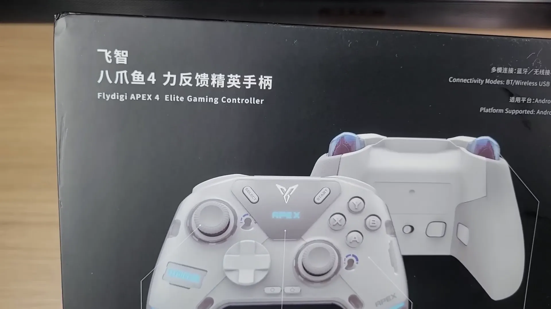 Flydigi Apex 4 early sample unboxing showing controller and accessories
