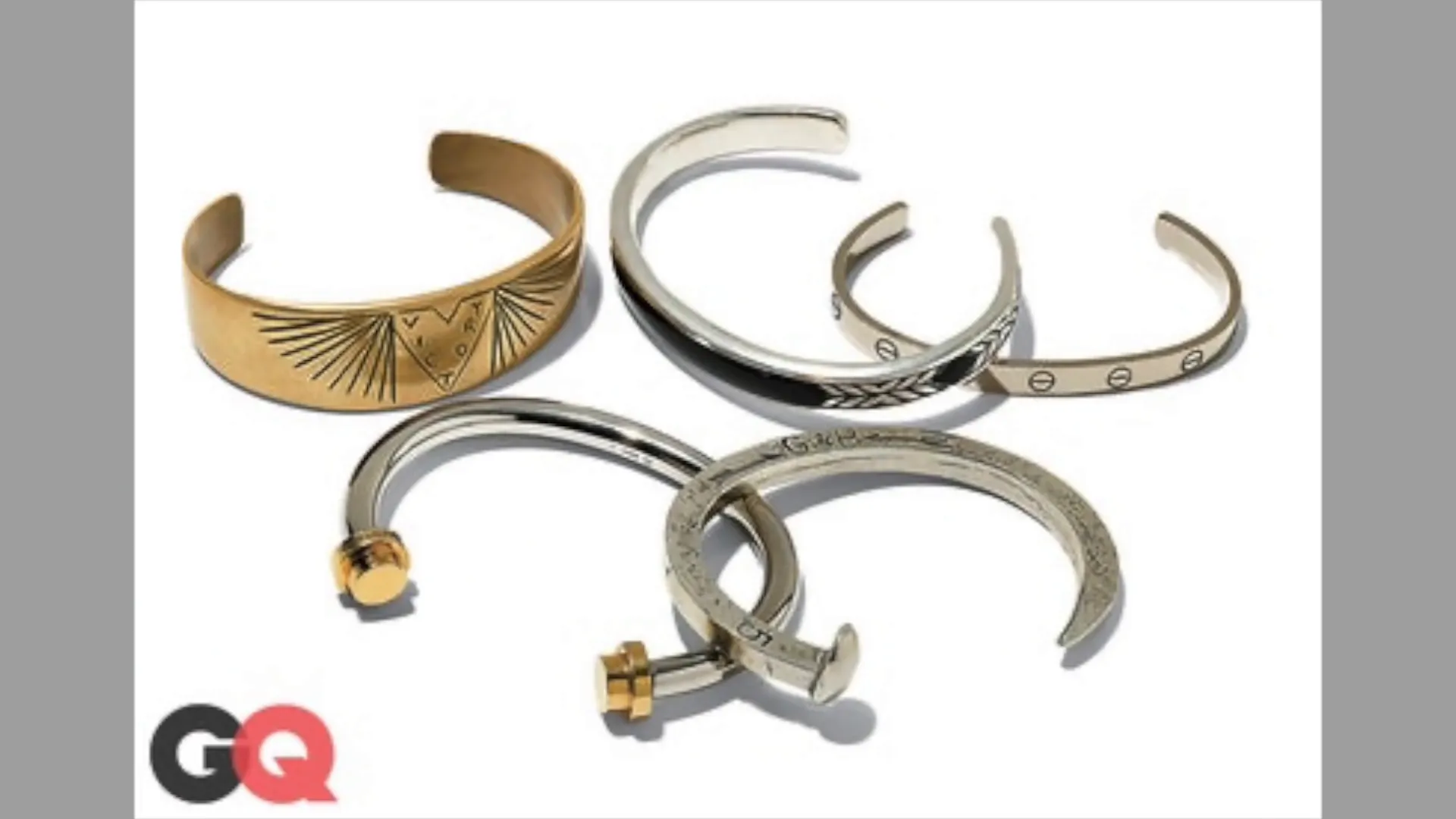 A close-up of a metal bracelet on a wrist