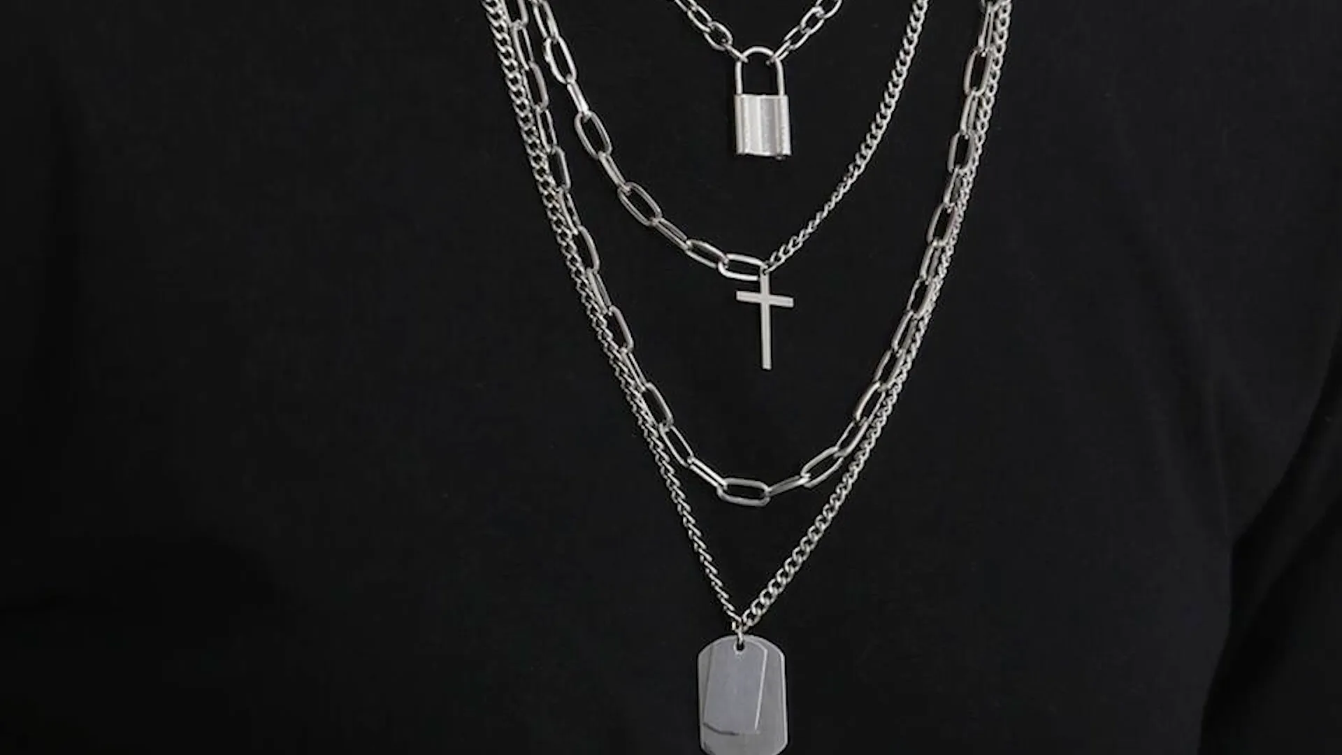 Layered necklaces on model