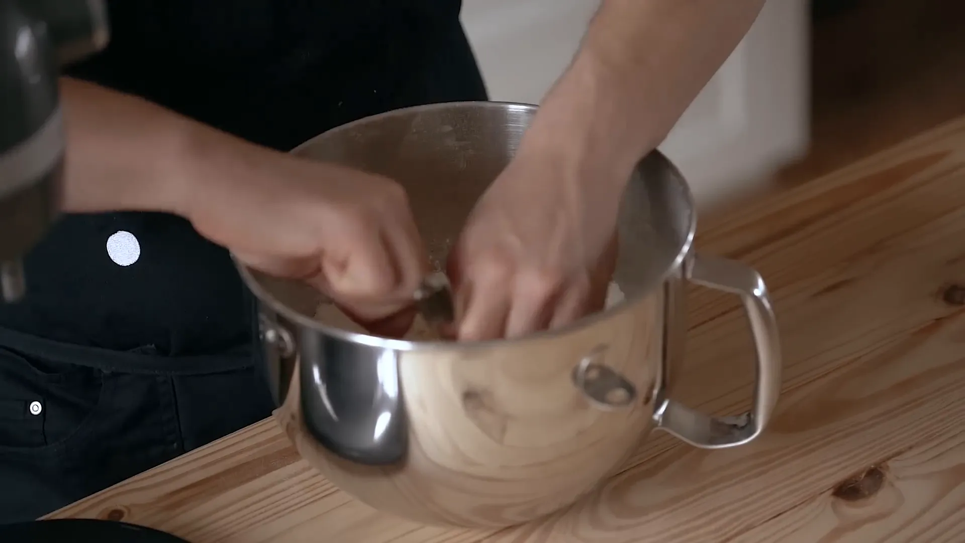 Blending in the butter with dry ingredients.