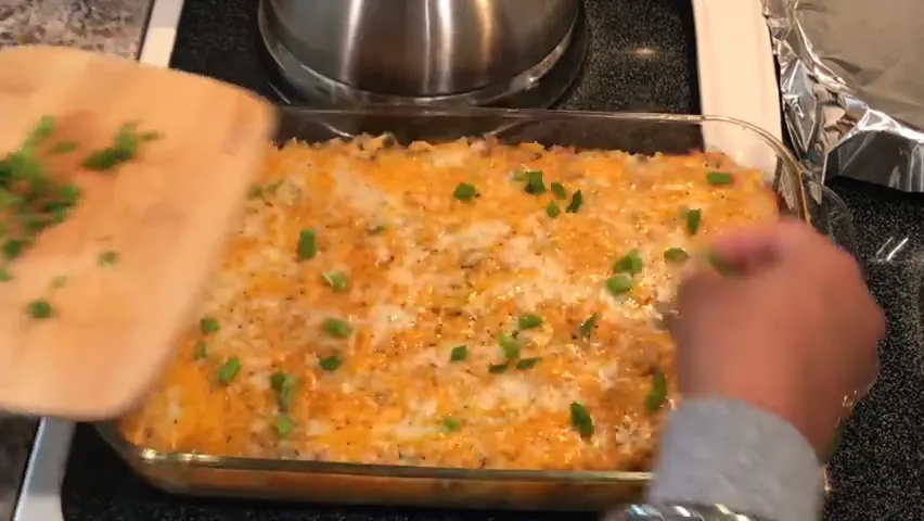 Removing the casserole from the oven