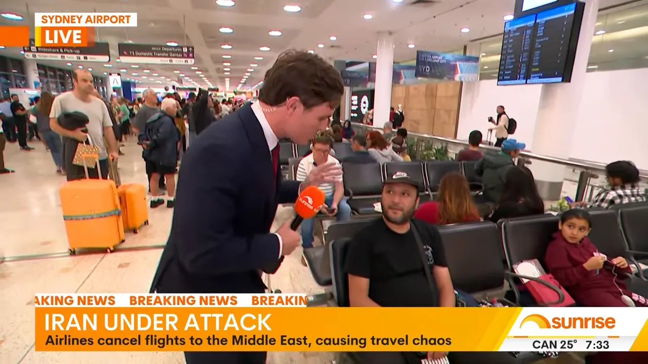 Reporter leaning in with a Sunrise microphone to interview a seated passenger in a crowded Sydney Airport gate area, departures screen and luggage visible.