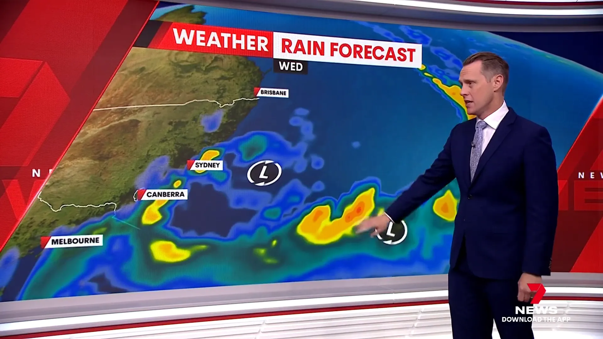 Meteorologist explaining Fujiwara effect and weather system interaction