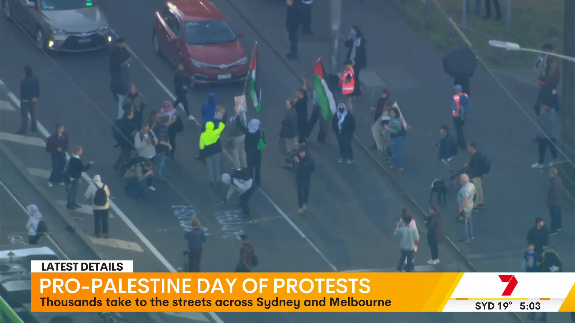 Protesters blocking Spencer Street Bridge in Melbourne