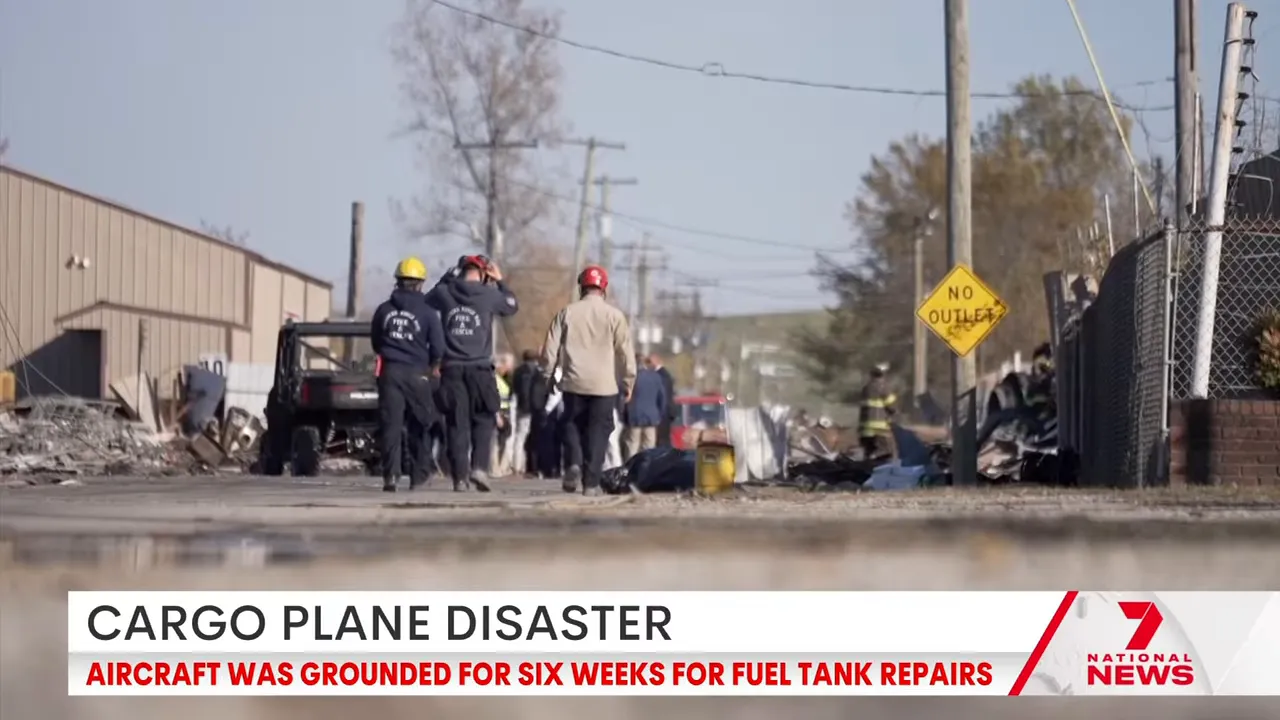 Damaged buildings and emergency response at crash site
