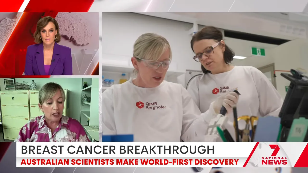 Two laboratory researchers in QIMR Berghofer lab coats using a pipette and reviewing samples