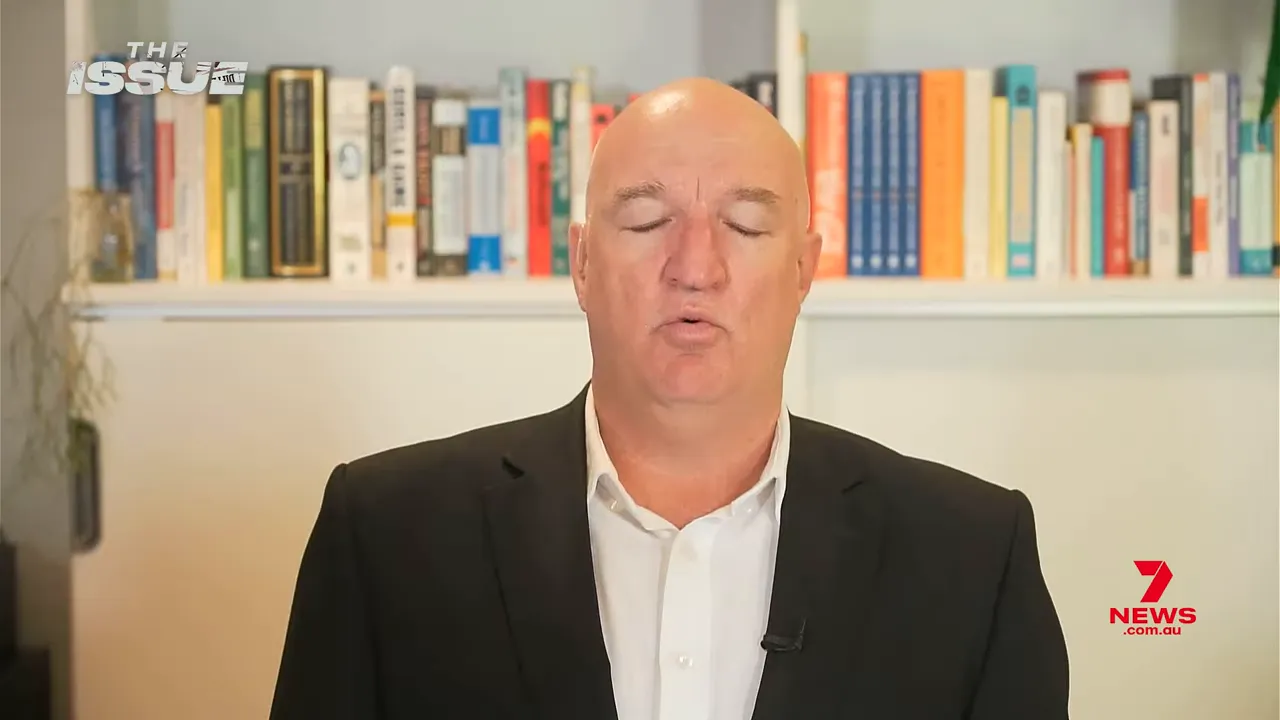 Presenter discussing delayed inflation effects from an Iran war oil crisis and global supply disruptions