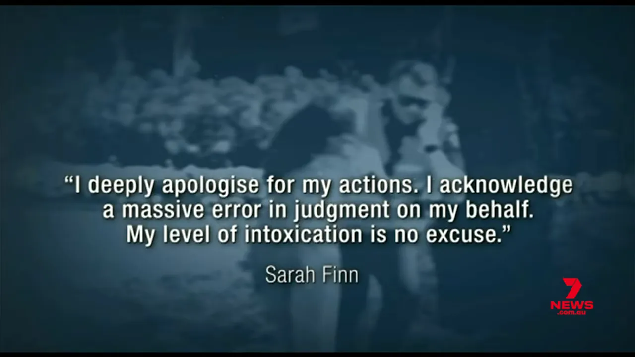 Woman in blue dress speaking to media, apologising for her actions