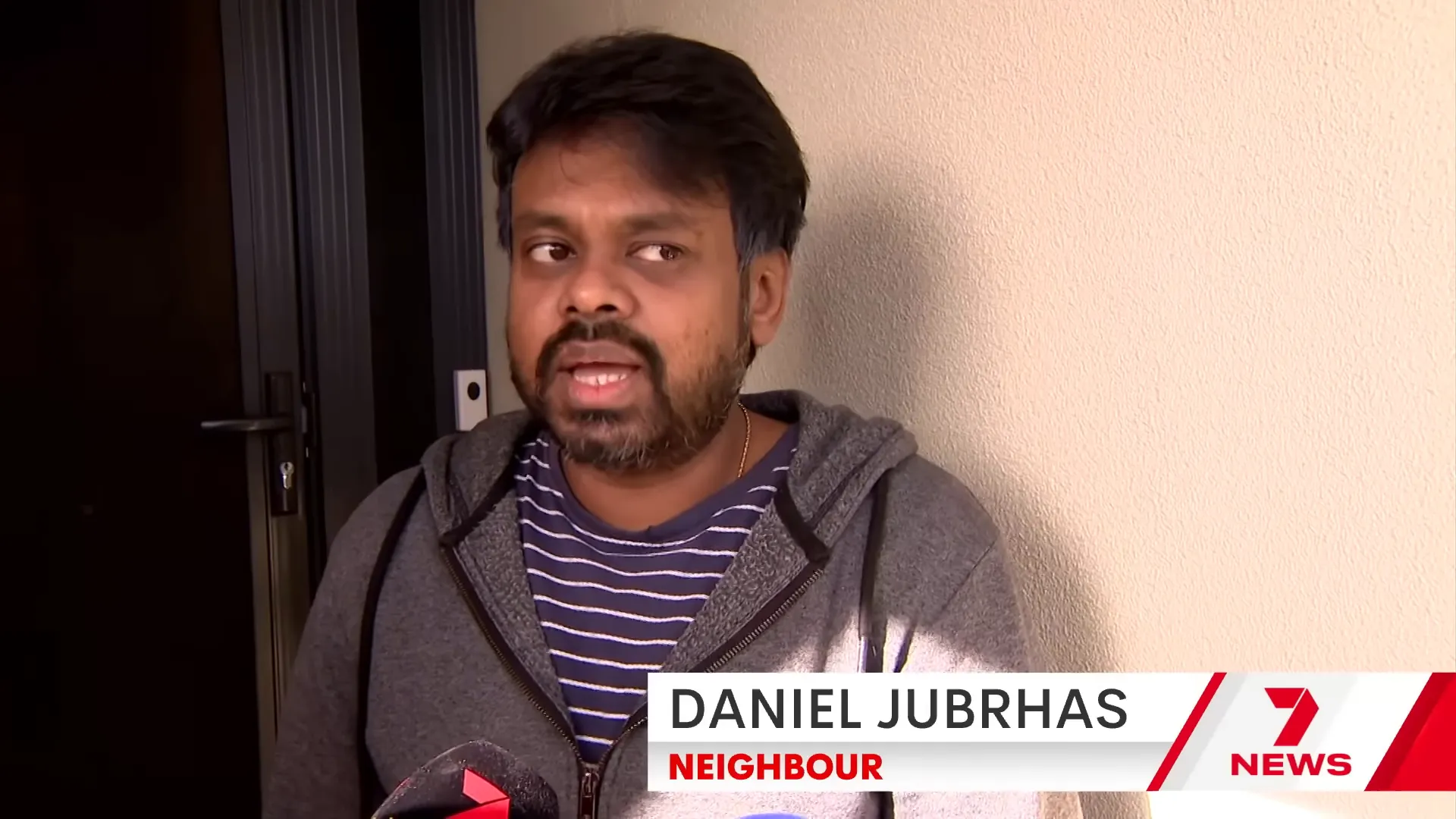 Neighbour reacting to news of the attack