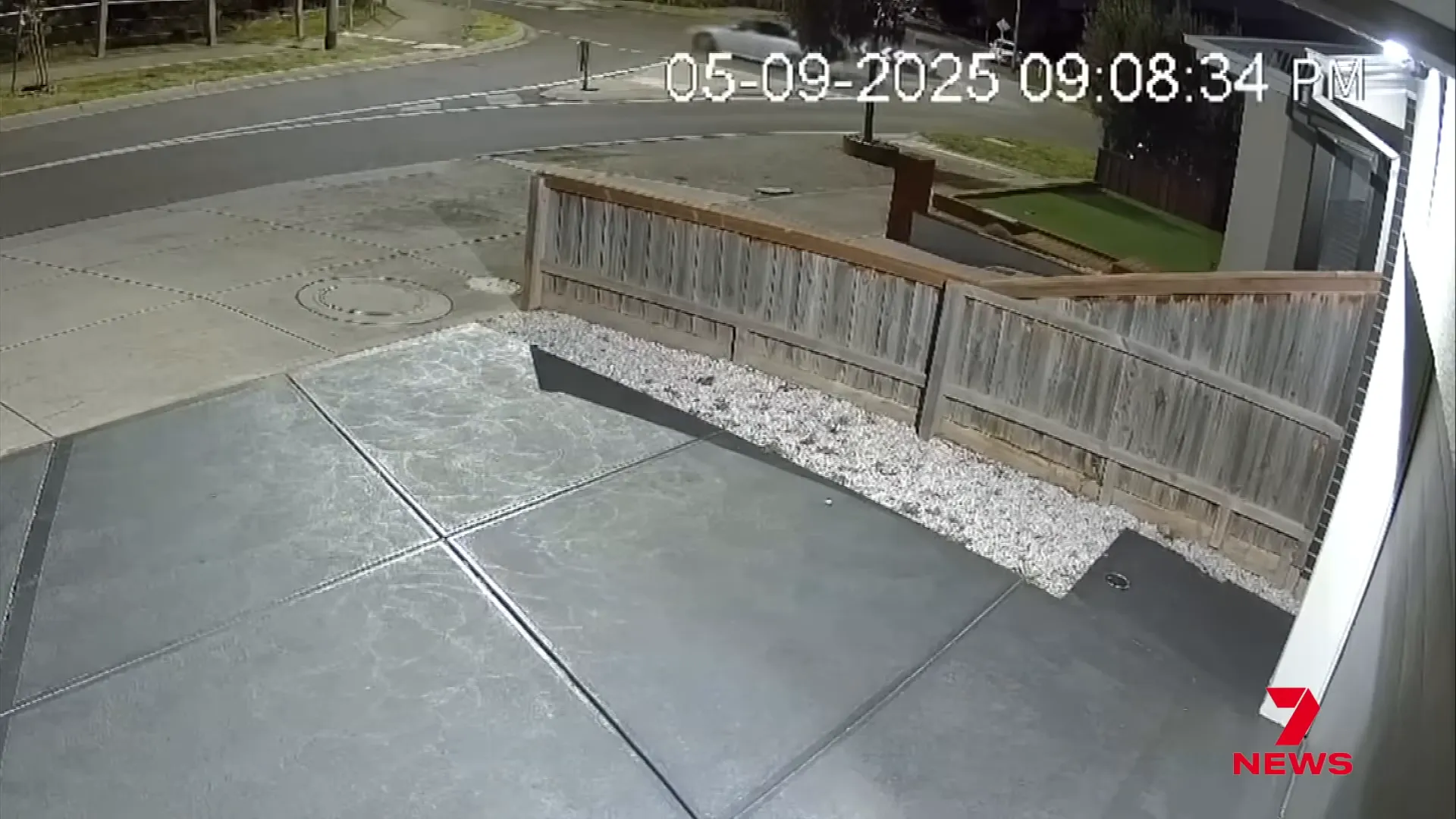 Suspects fleeing in a getaway car