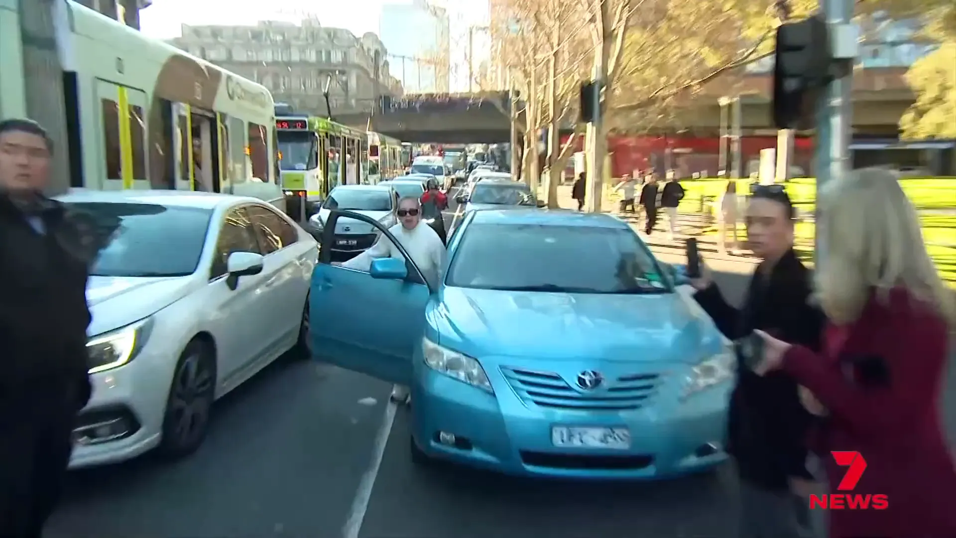 Distressed woman allowed through protest blockade