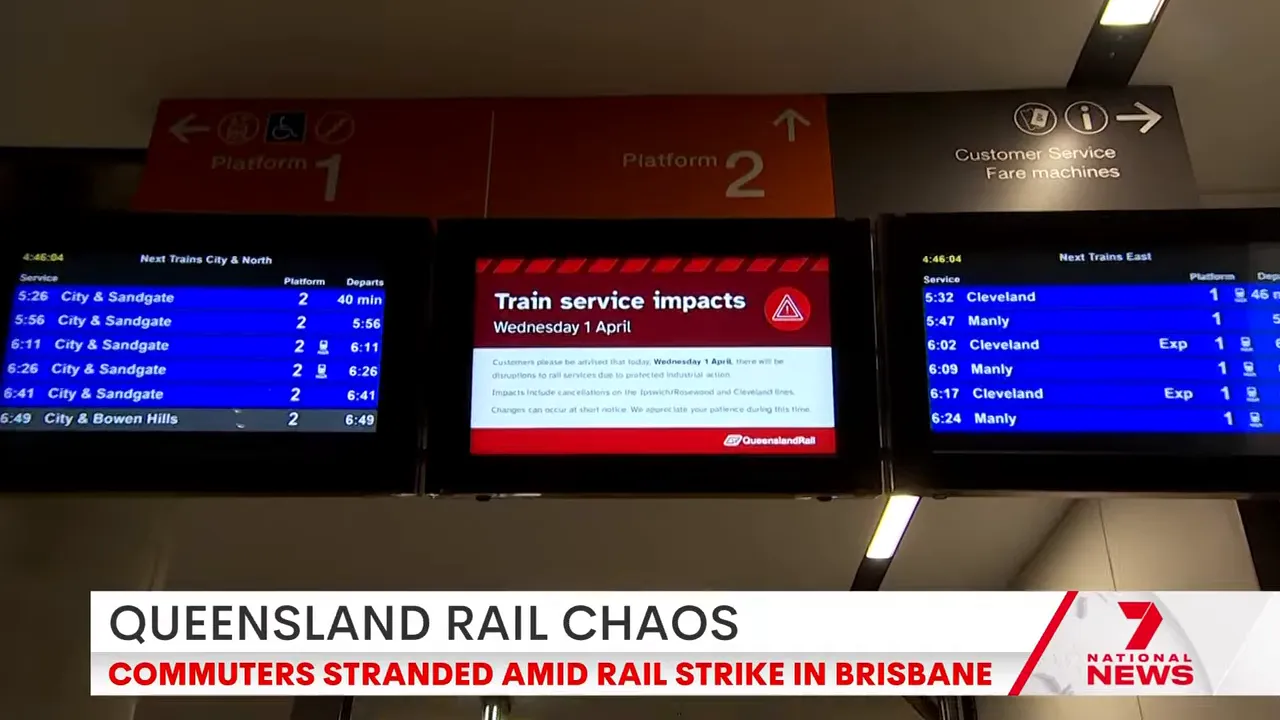 Queensland Rail train service impact screens showing disruptions at Brisbane station