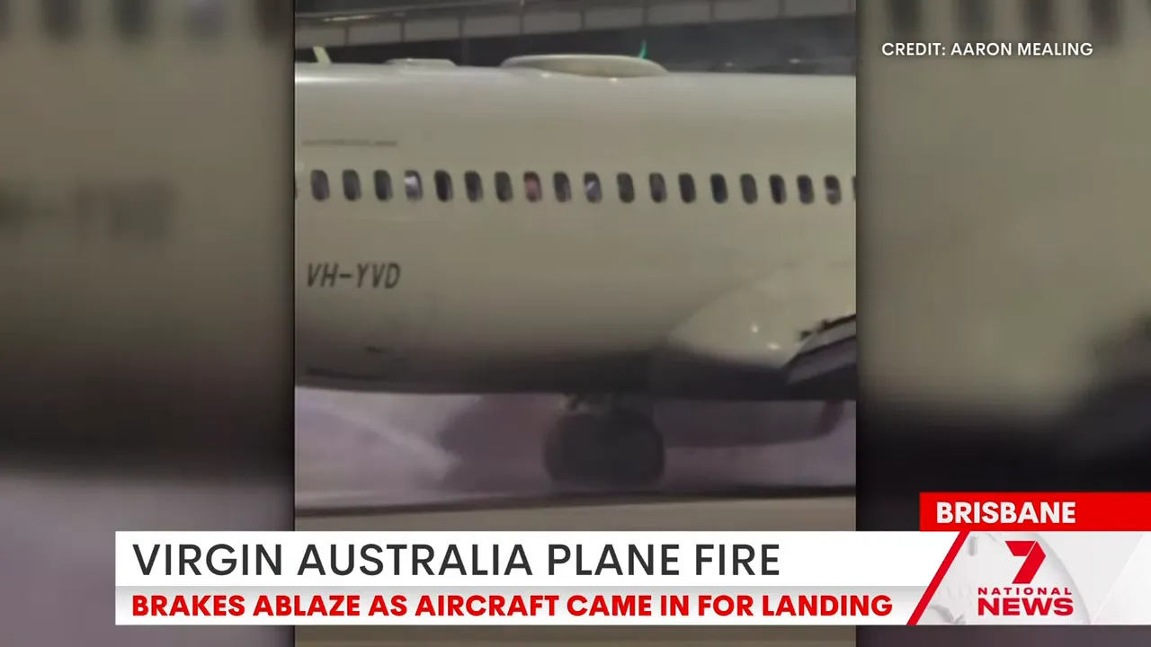 Ground engineers preparing to inspect the aircraft after the fire was extinguished