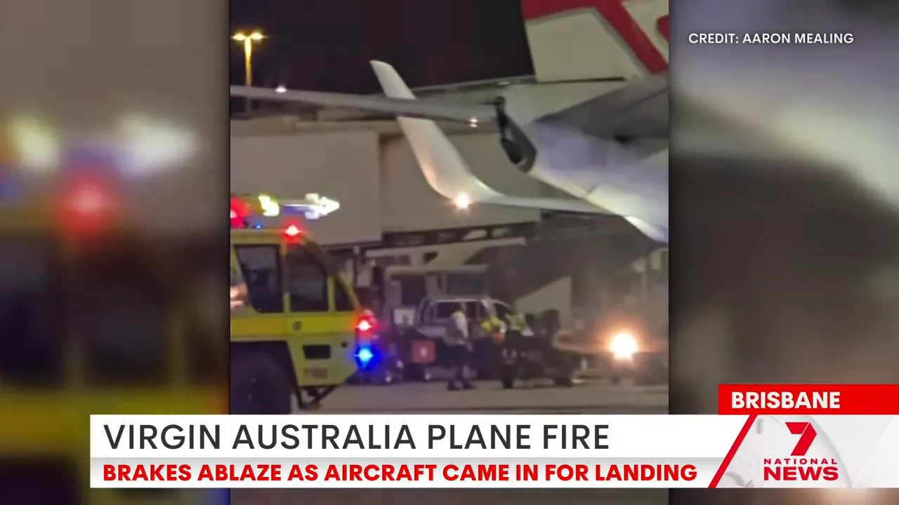 Passengers and crew disembarking onto the tarmac and being met by emergency personnel