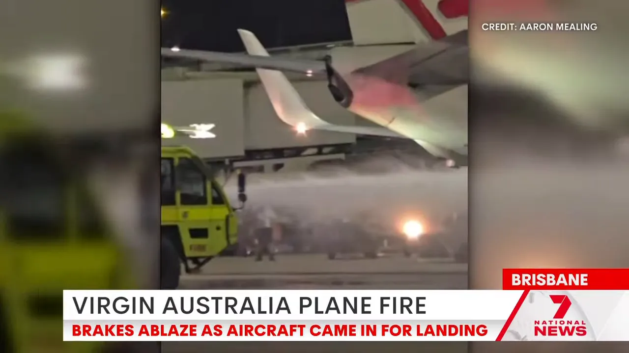 Firefighters at the scene inspecting the aircraft brakes