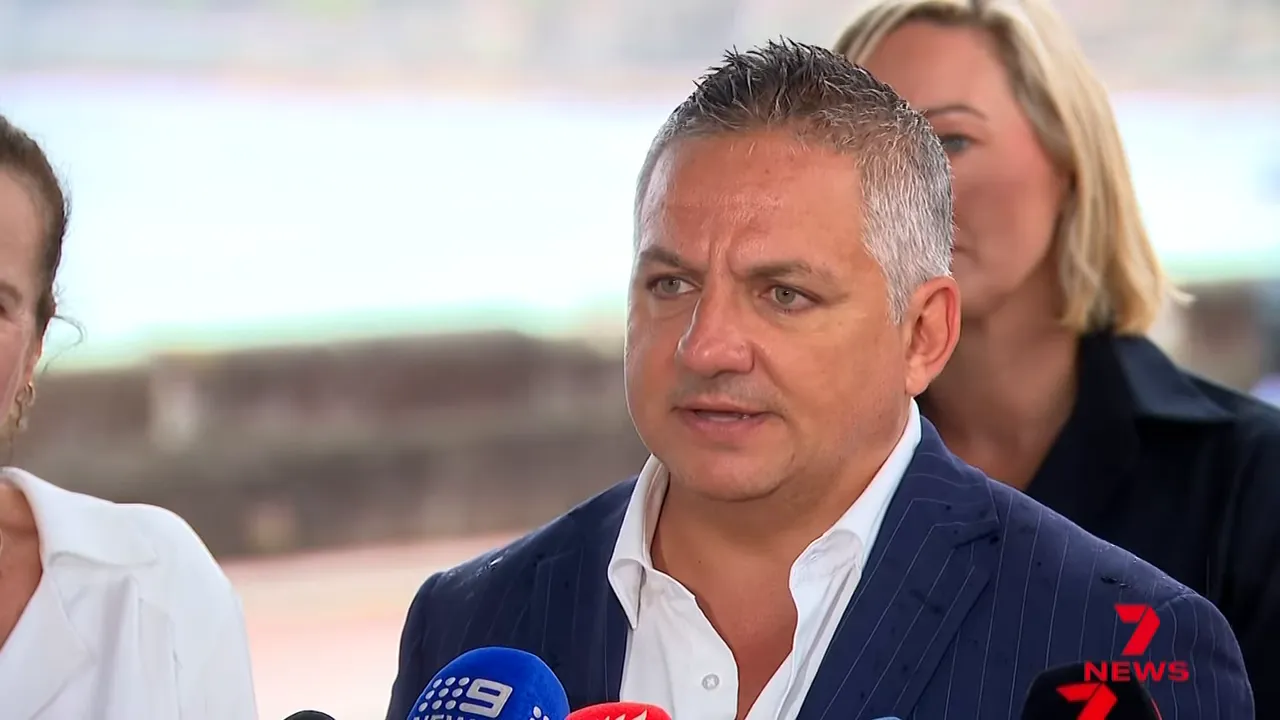 Spokesperson speaking at an outdoor press conference about tougher action on illegal e-bikes