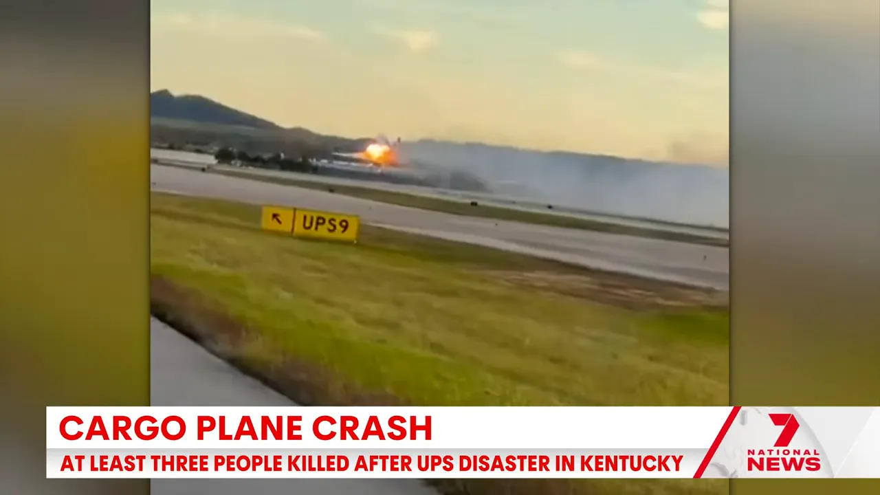 News correspondent describing the crash scene with emergency response vehicles visible