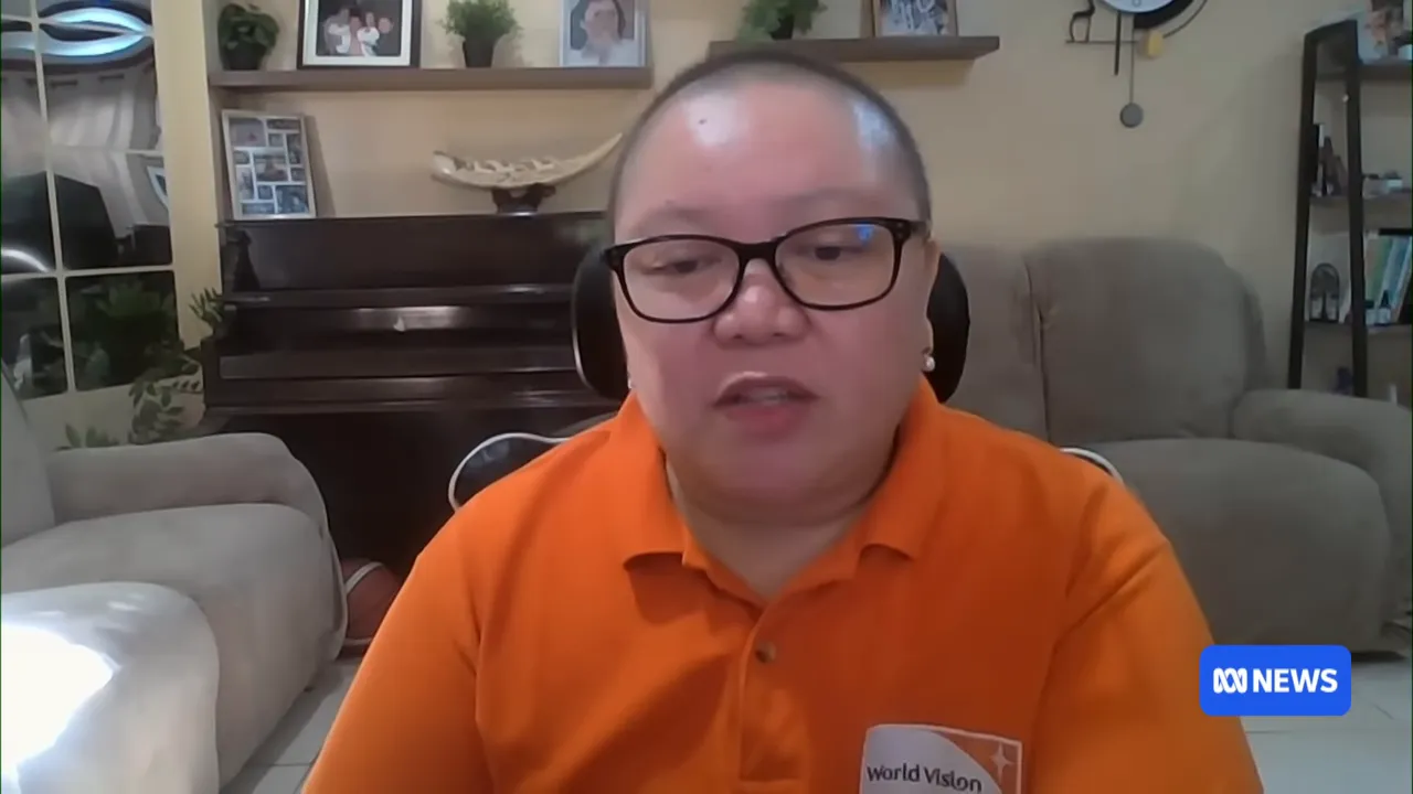 World Vision staff coordinating and checking on registered families