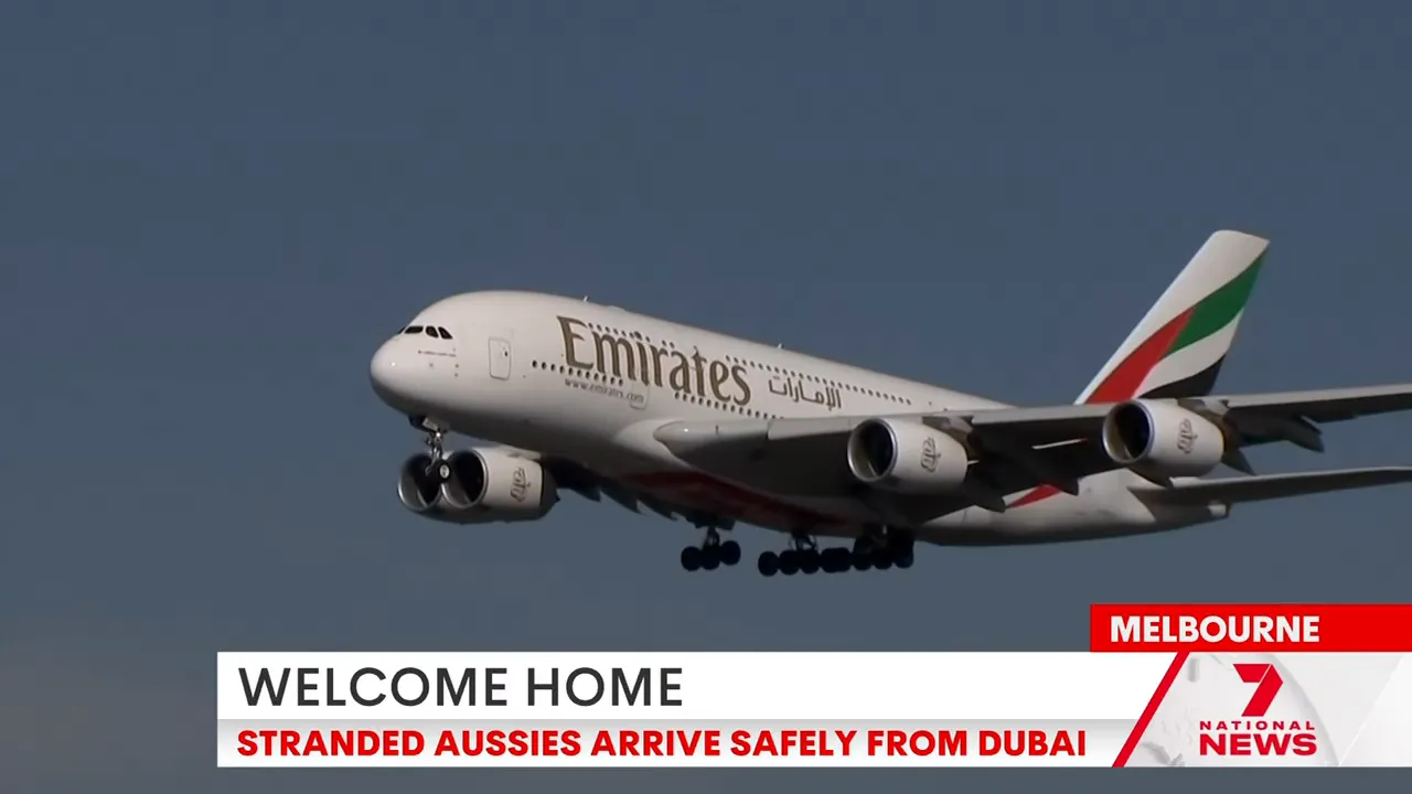 Emirates passenger jet on final approach landing for repatriation flight