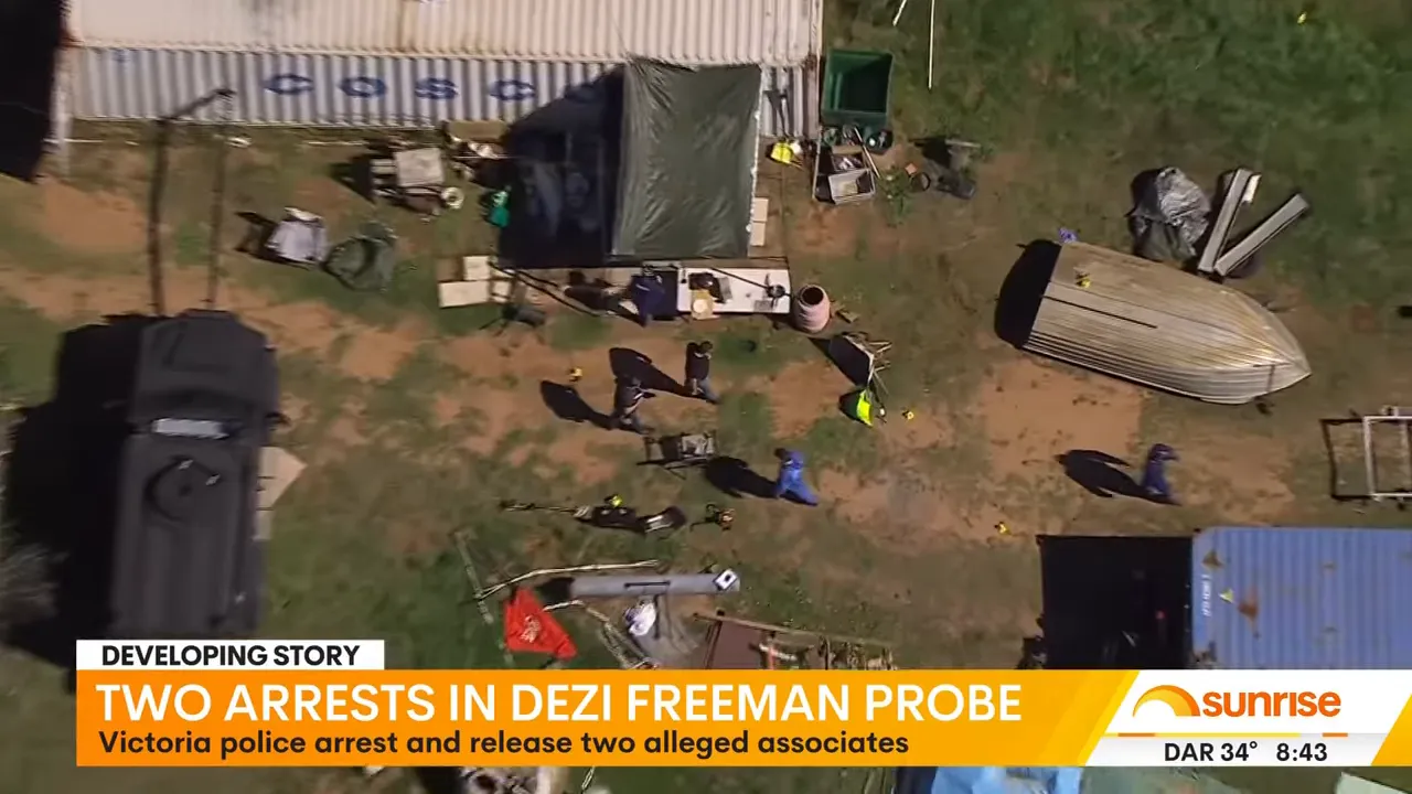 Aerial view of police operation at the Dezi Freeman probe site with investigators and equipment