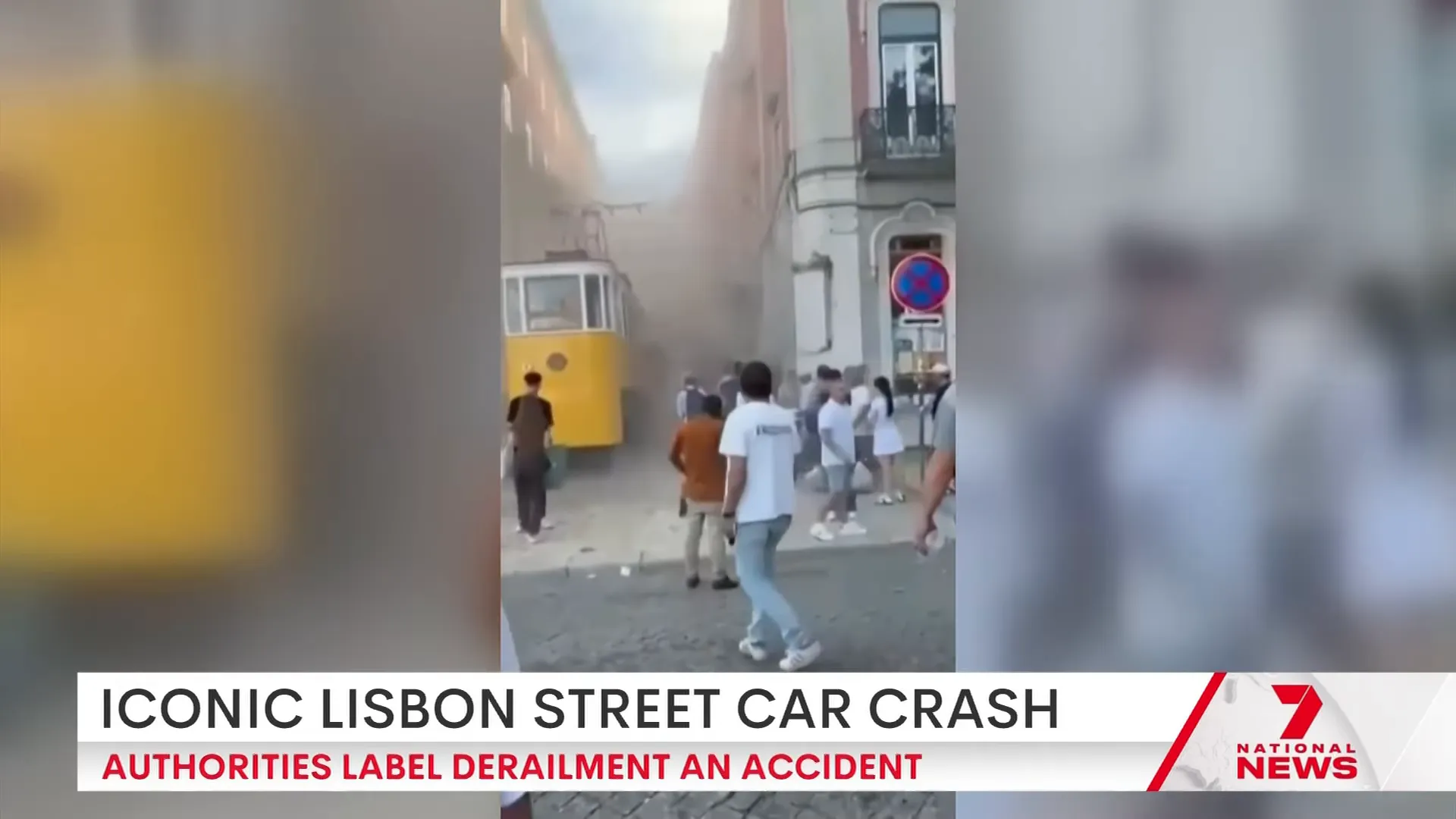 Smoke and dust rising after a tram collided with a building