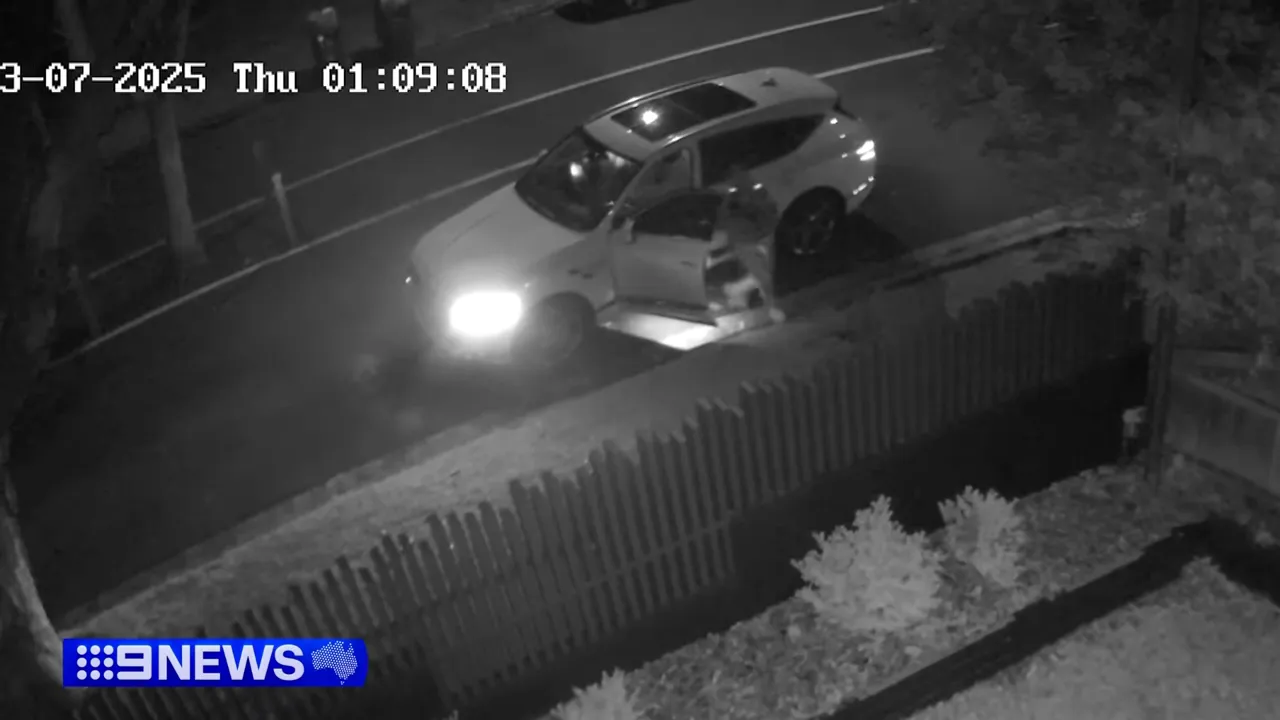 Masked figure stepping out into the dark