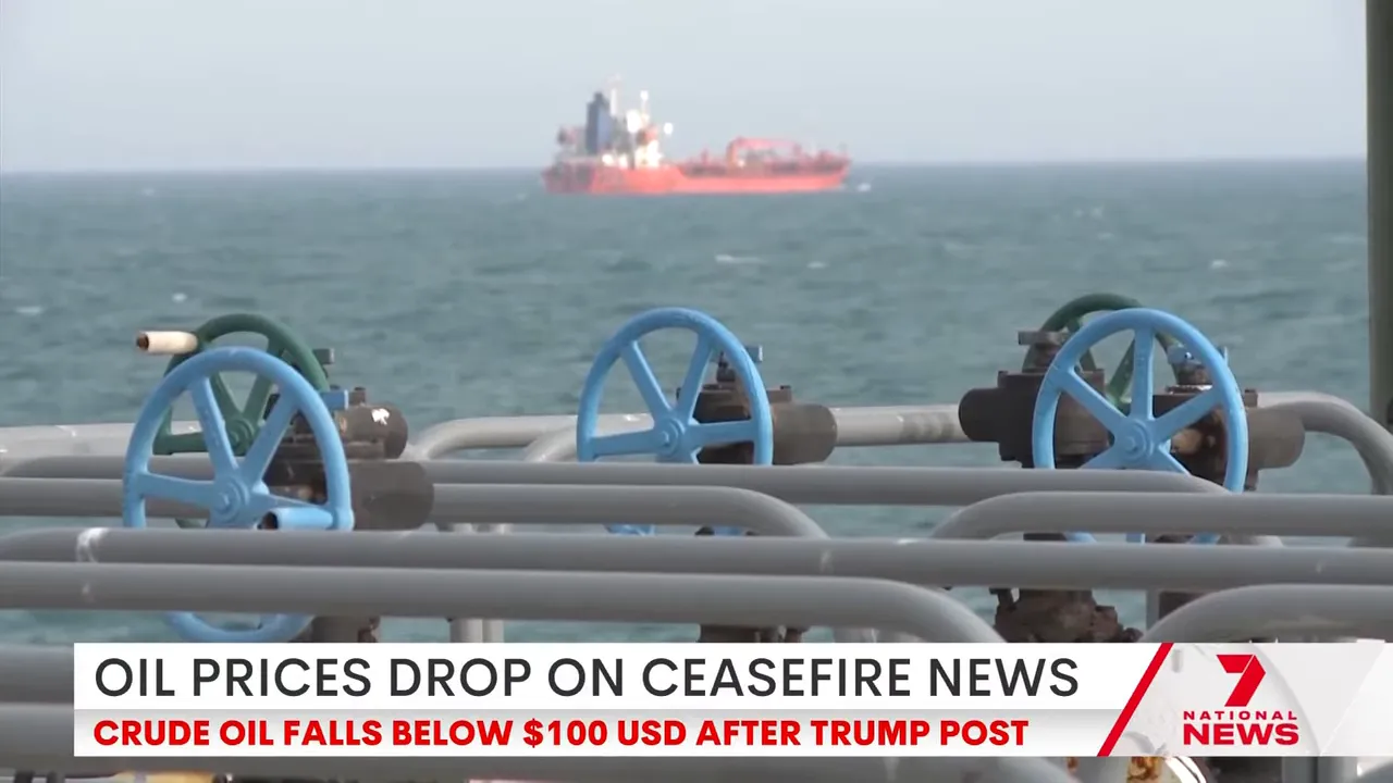 View from an offshore oil vessel looking over the sea with a tanker in the distance and news text about crude oil falling