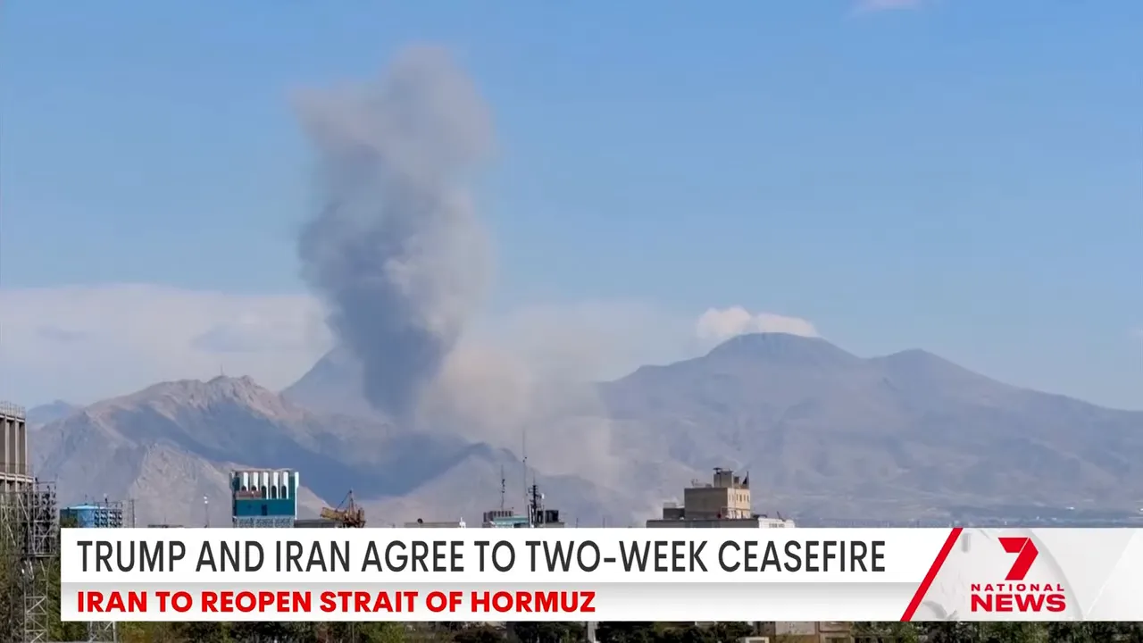 Smoke and harbour scene with TV news graphic: Trump and Iran agree to a two-week ceasefire and reopen the Strait of Hormuz