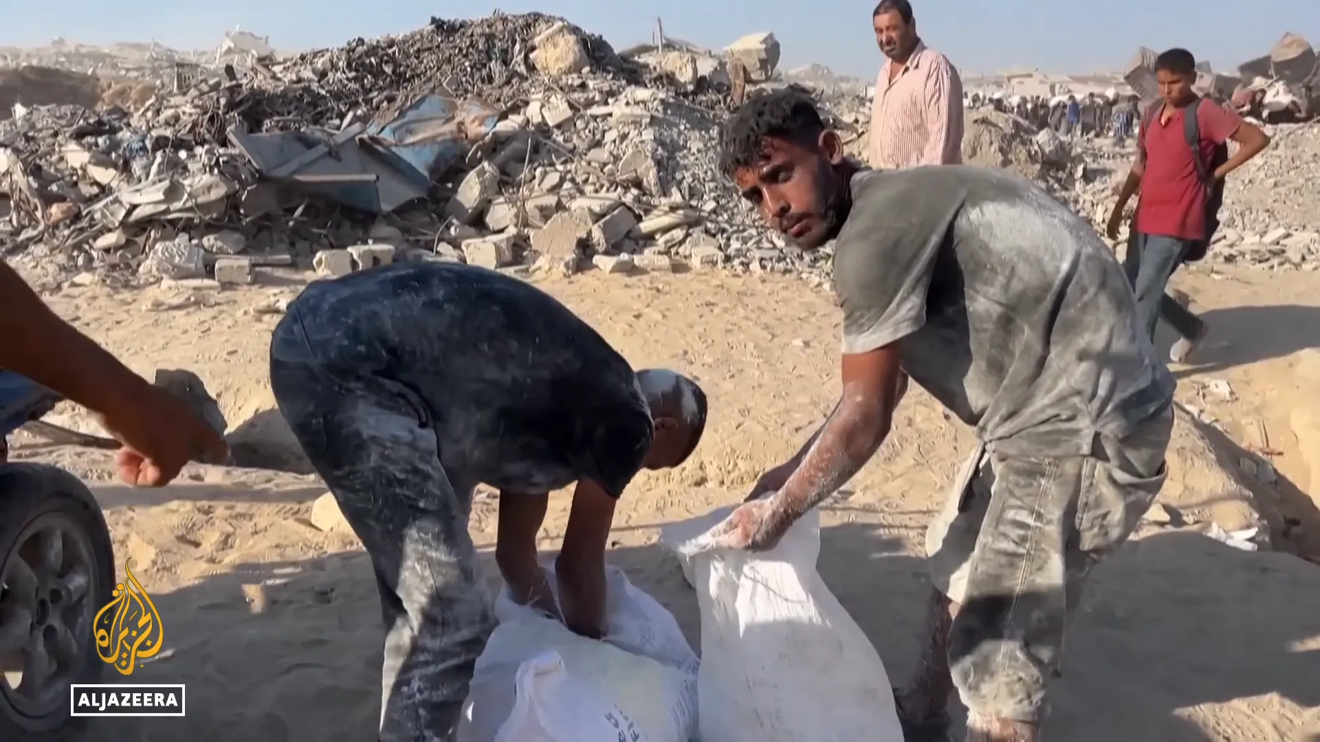 Hungry Palestinians searching for food in Gaza