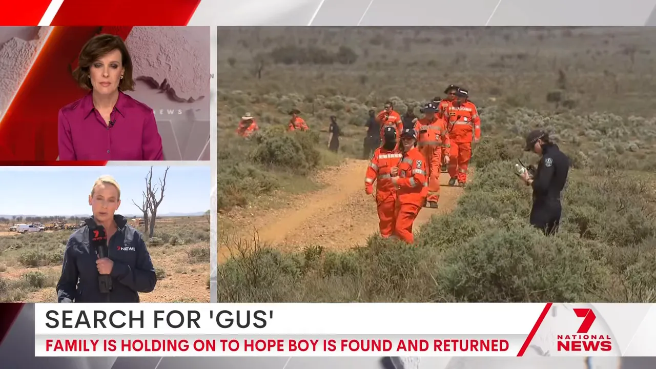 Searchers examine ground where a footprint was found