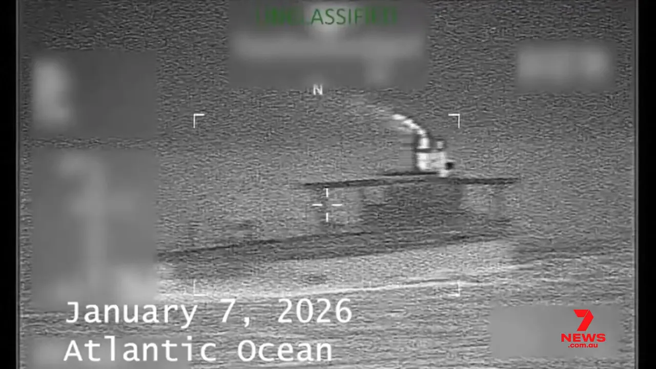 black-and-white thermal surveillance image of a tanker at sea with 'January 7, 2026 Atlantic Ocean' overlay and news watermark