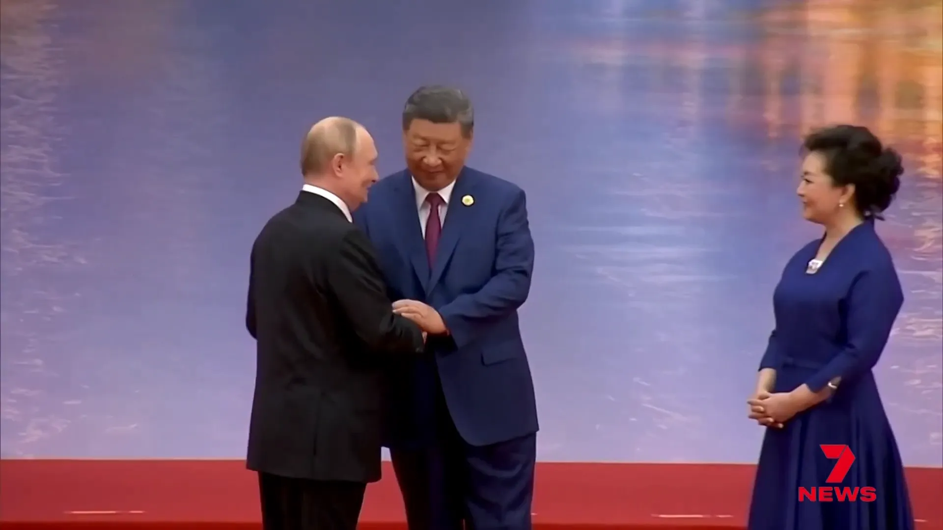 Xi Jinping on stage welcoming foreign leaders