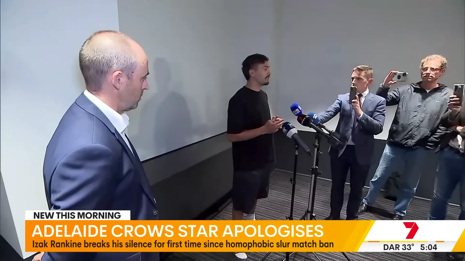 Isaac Rankin addressing media at Adelaide Airport