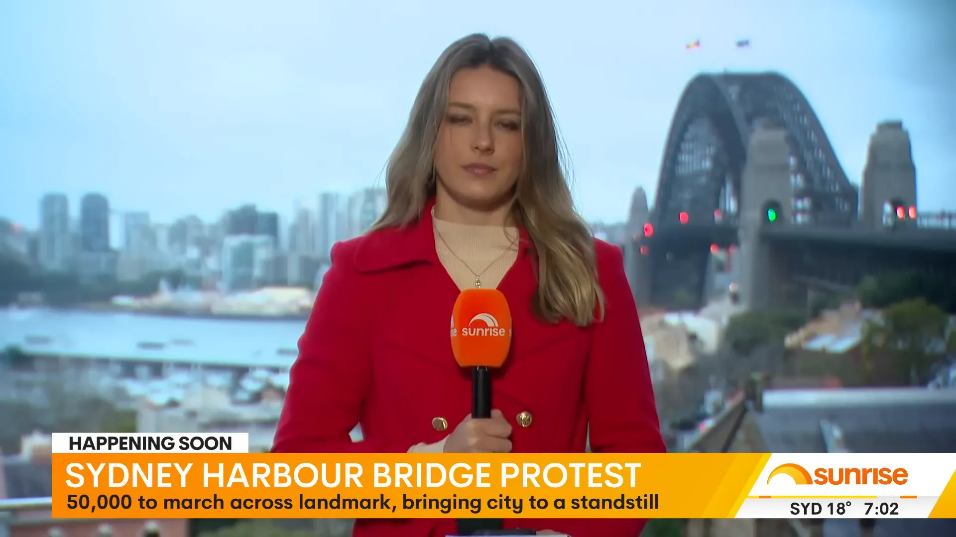 Large crowd gathering on Sydney Harbour Bridge for protest