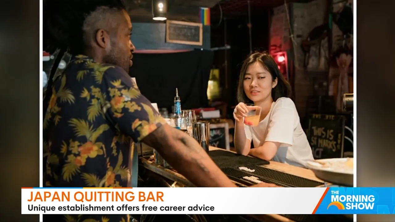 Woman holding a drink and speaking with a bartender at a bar counter, warm lighting and visible bar tools