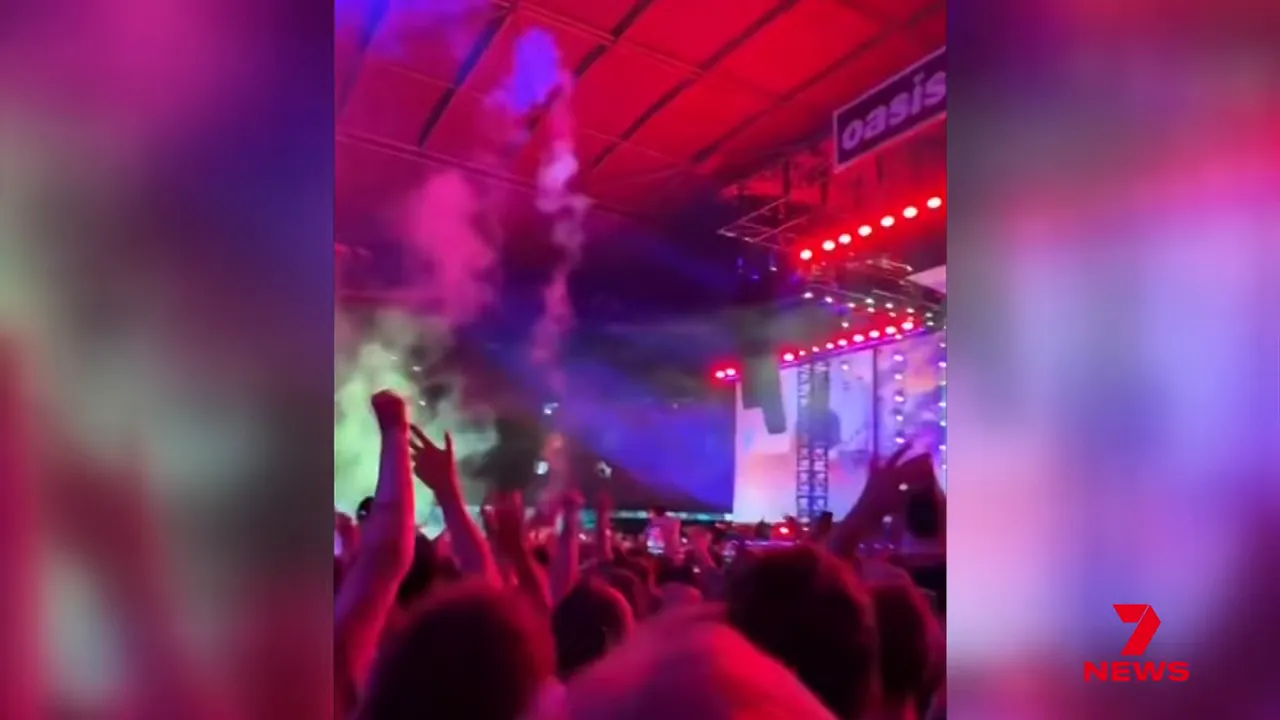 Crowd flare thrown into audience