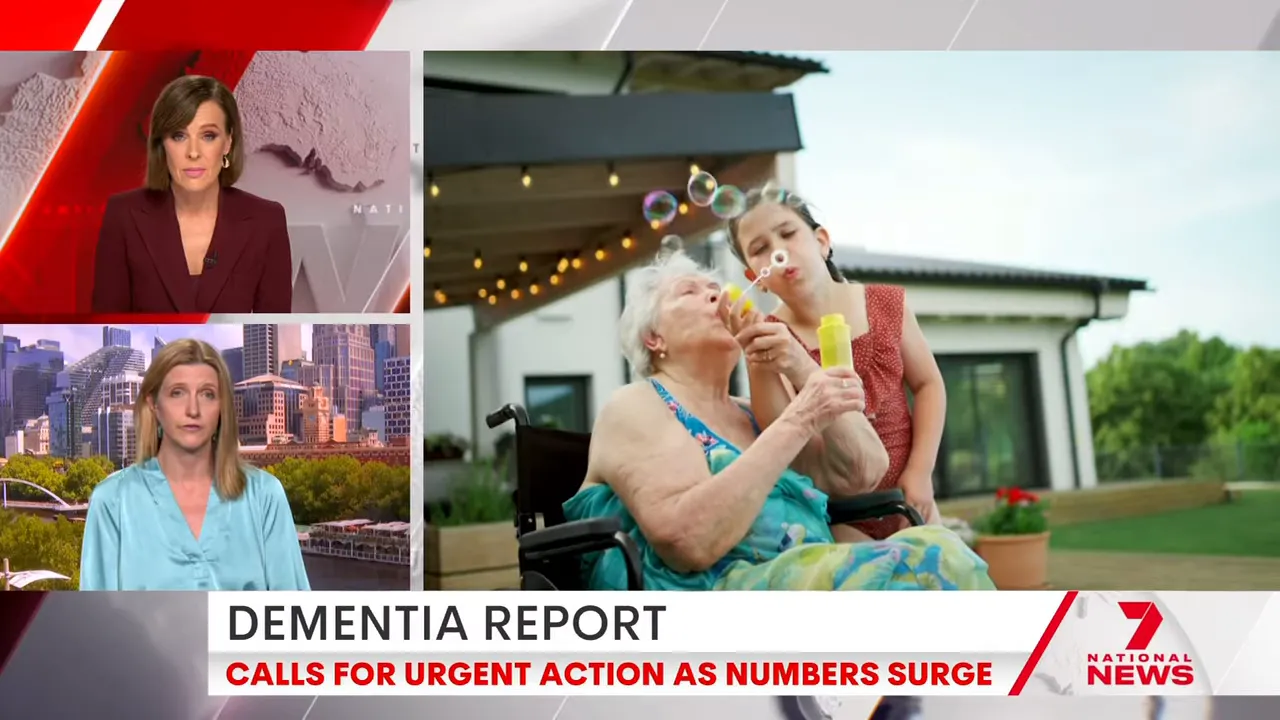 Young girl and elderly woman blowing bubbles together outdoors